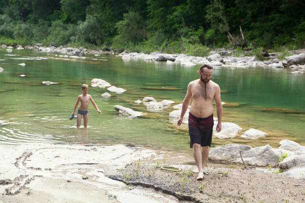 Father and son at the river