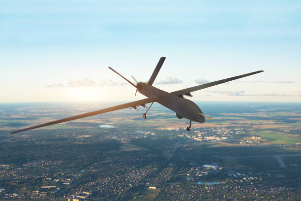 istock Patrolling unmanned aircraft in the sky above the terrain, fly tracking. 1044113752