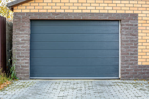 vloot Secretaris moe Automatic Garage Gate Access To A Brick Garage For A Car With A Dark Door  Stock Photo - Download Image Now - iStock