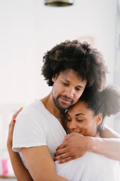 istock Young beautiful couple in the kitchen 1044140900