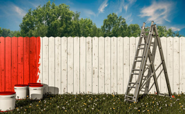istock painted wooden fence 1044144840