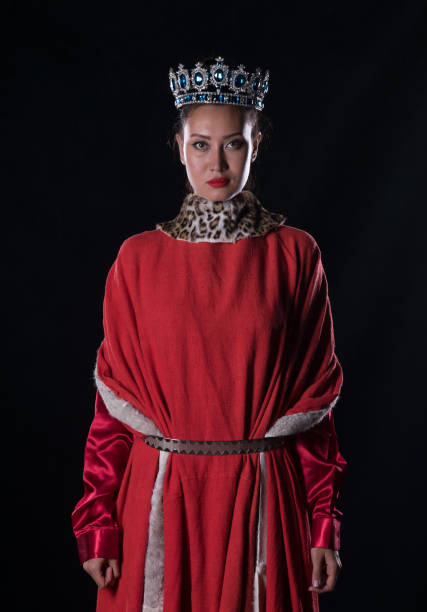 istock Princess with a crown, studio portrait on a black background 1044145178