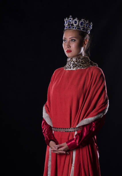 istock Princess with a crown, studio portrait on a black background 1044146592