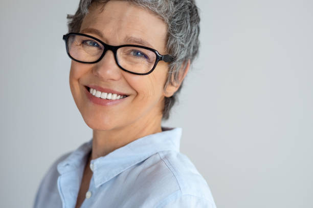 istock Happy senior woman with spectacles 1044150180