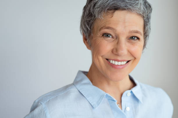 istock Happy smiling mature woman 1044150184