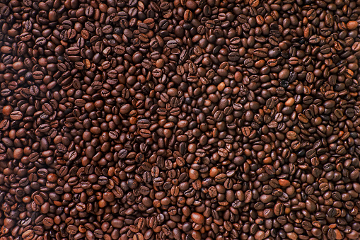 Brown Coffee Beans Background. Close Up.