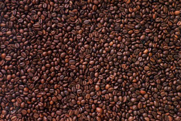 Brown Coffee Beans Background. Brown Coffee Beans Background. Close Up. texture cafe stock pictures, royalty-free photos & images