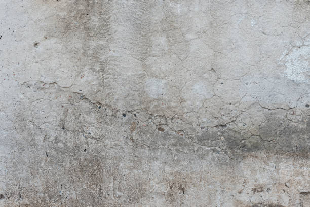 istock Wall fragment with attritions and cracks 1044158676