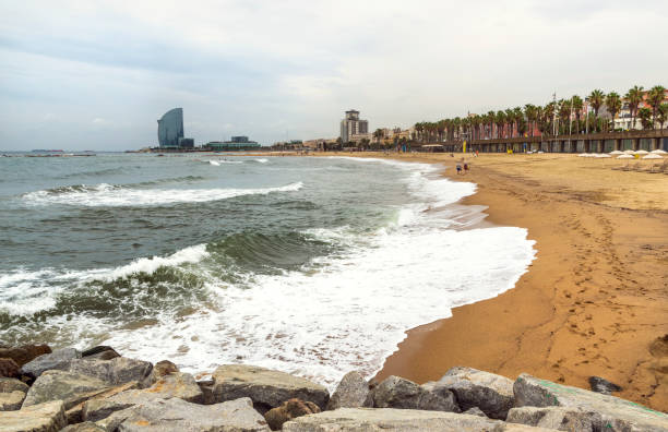 istock Beach in Barcelona on a cloudy day 1044166050