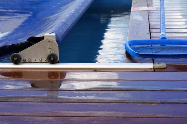 istock Hotel staff worker cleaning the pool 1044171070
