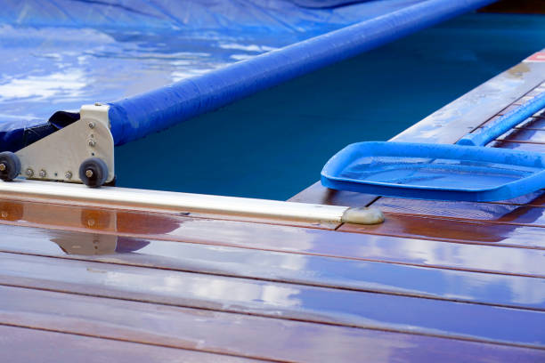 istock Hotel staff worker cleaning the pool 1044171228