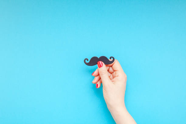 istock Paper moustaches for men fathers dad concept 1044171678