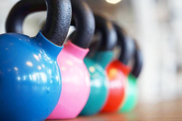istock Colorful kettlebells in gym 1044171692