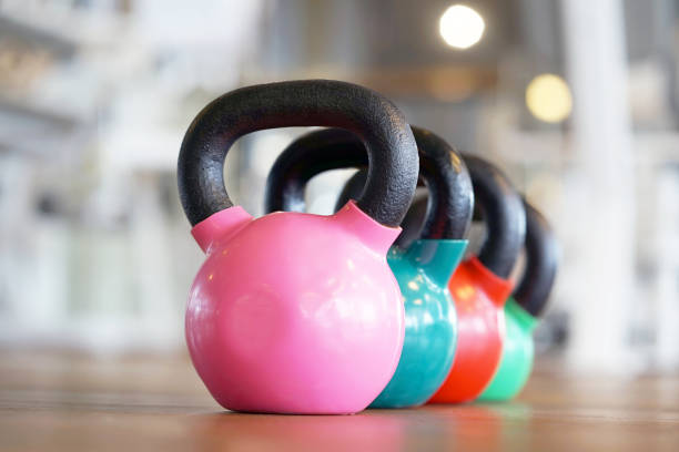 istock Colorful kettlebells in gym 1044171858