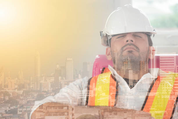 istock Tired worker fall asleep or Engineer feel stressed and tried asleep during working at the construction site, With back ground of city. 1044177948