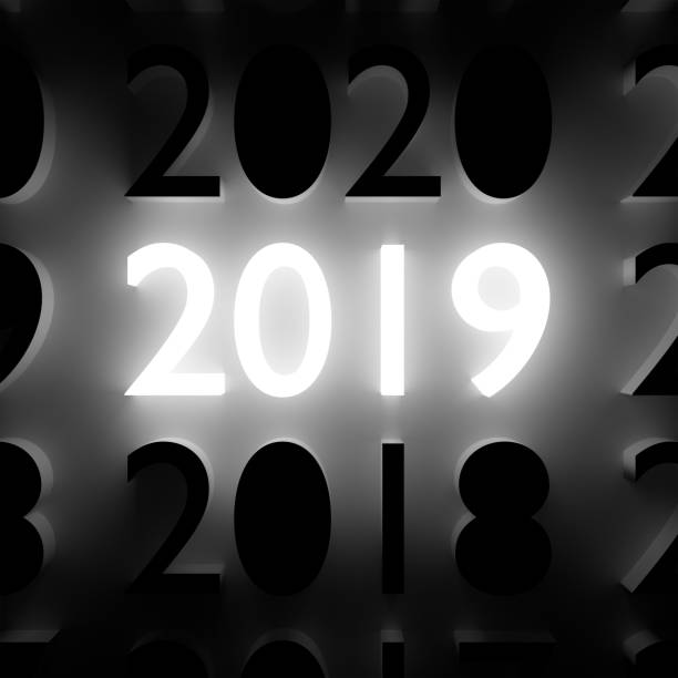 istock Luminous number 2019 on wall. New Year concept 1044180332