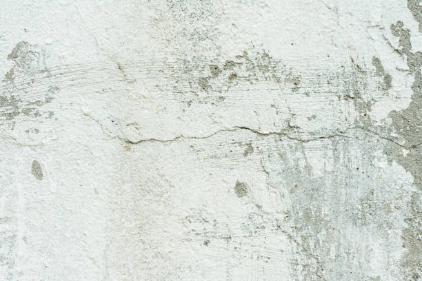 istock Wall fragment with attritions and cracks 1044181186