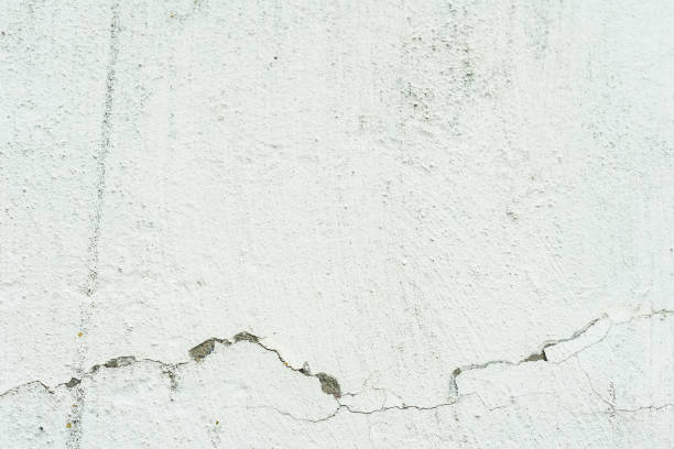 istock Wall fragment with attritions and cracks 1044181474