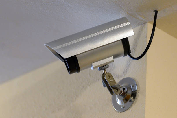 istock surveillance camera on the ceiling in the room 1044181776