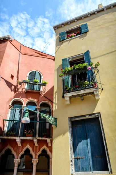 Street in Venice Historical center of Venice, picturesque, colorful and rustic street with beautiful old buildings. Venice one of the most famous travel destination in the world is a city in northeastern Italy and the capital of the Veneto region. venice italy grand canal honeymoon gondola stock pictures, royalty-free photos & images