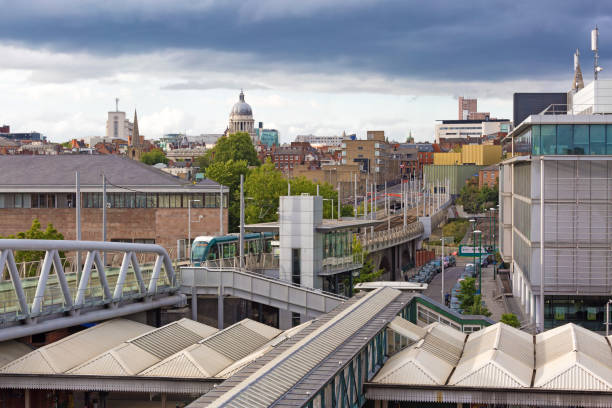 Nottingham City Centre Skyline A skyline of Nottingham city centre with a view of Nottingham Council House and Station Street tram stop. A view over a tram bridge which crosses over Station Street from Nottingham train station nottingham stock pictures, royalty-free photos & images