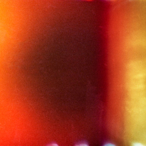 istock Colorful abstract background with grain and light leak 1044188196