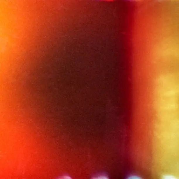 Photo of Colorful abstract background with grain and light leak