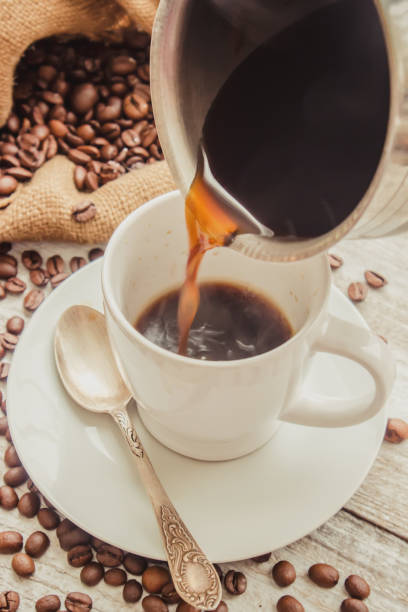 istock coffee bean. a Cup of coffee. selective focus. 1044196512