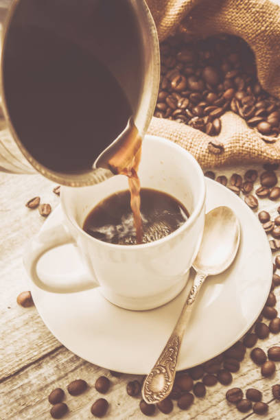 istock coffee bean. a Cup of coffee. selective focus. 1044196638