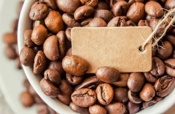 Photo of coffee bean. a Cup of coffee. selective focus.