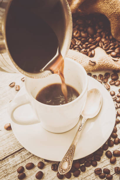 istock coffee bean. a Cup of coffee. selective focus. 1044201508