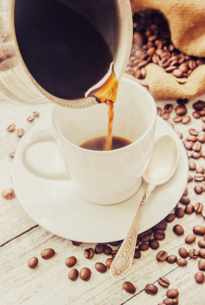istock coffee bean. a Cup of coffee. selective focus. 1044201542