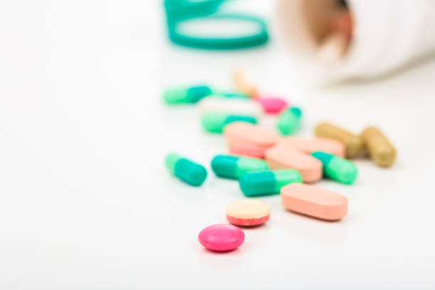 istock Pills out of a bottle 1044205172