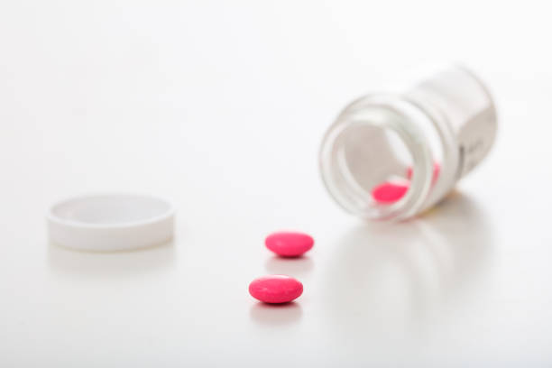istock Capsules out of a bottle 1044205196