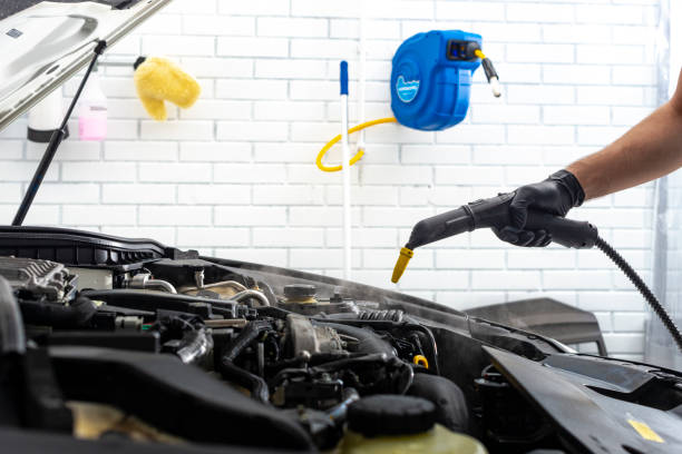 istock cleaning car engine with hot steam 1044205354