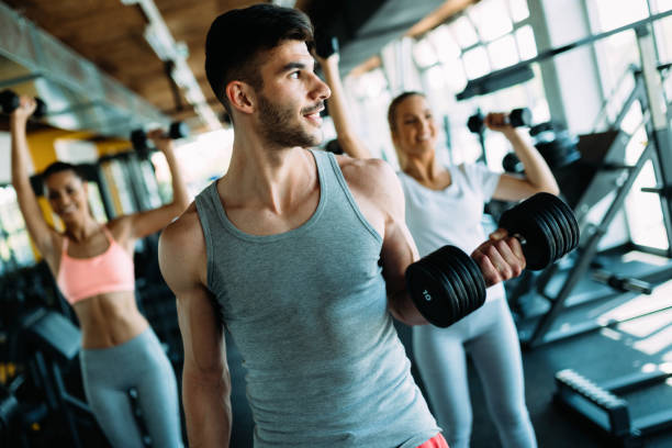 istock Group of people training in gym 1044208482