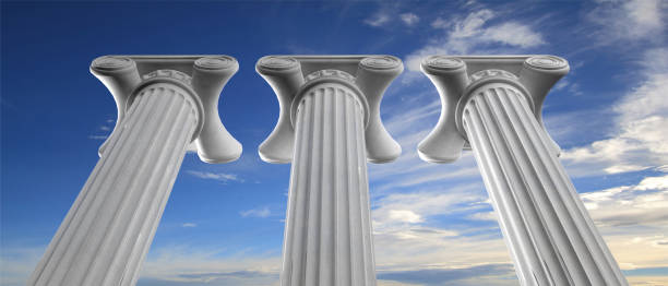 istock Sustainability concept. Three marble pillars on blue sky background. 3d illustration 1044211272