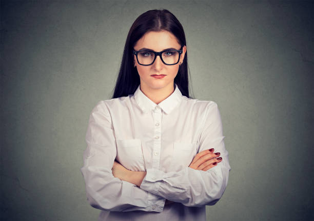 istock Serious grumpy woman in glasses 1044217328