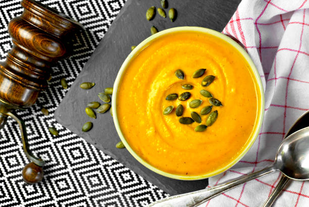 Hokkaido or butternut pumpkin soup with curry and seeds