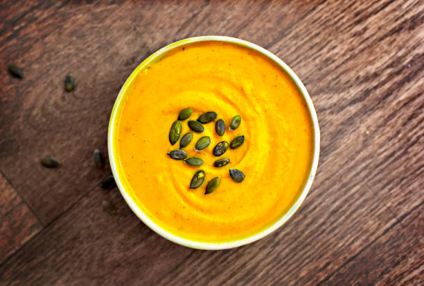 Hokkaido or butternut pumpkin soup with curry and seeds