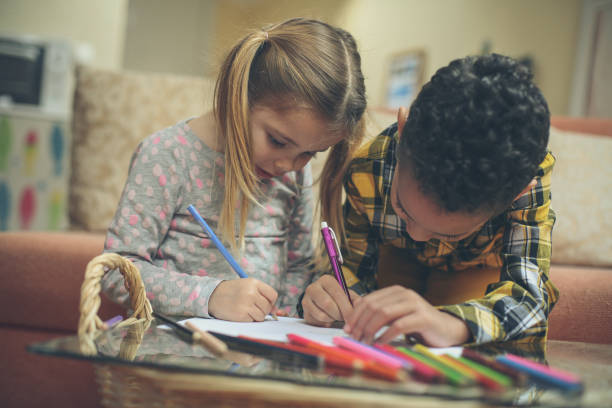 istock Little smart girl and boy. 1044227310