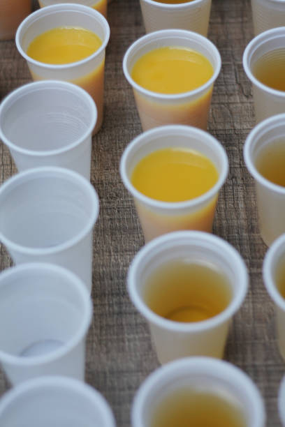 istock Disposable cups with soda and juices 1044229712