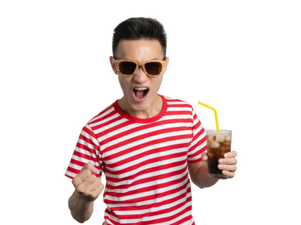 istock Young man smile with soft drink asian people portrait. 1044232526