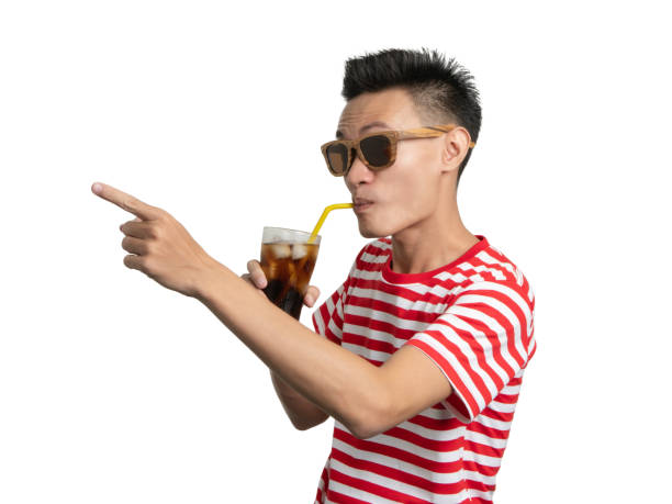 istock Young man smile with soft drink asian people portrait. 1044232742