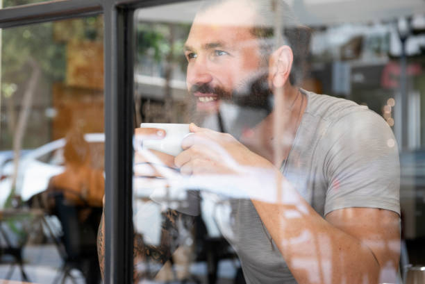 istock Young man in the coffee shop 1044239522