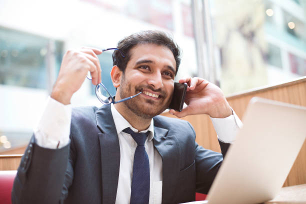 istock Businessman talking on mobile phone 1044240312