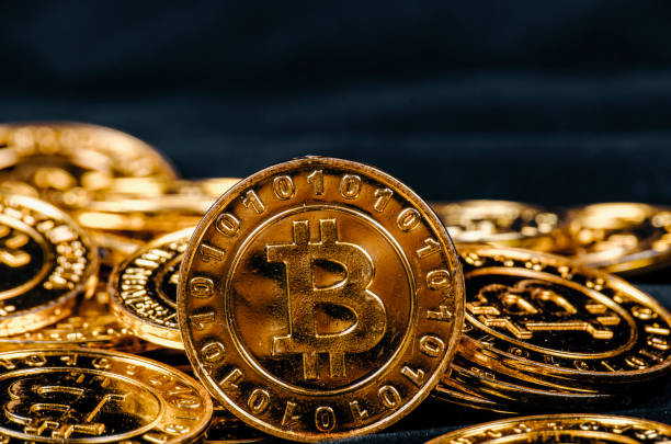 istock worldwide cryptocurrency, huge stack physical version of golden Bitcoin 1044257894