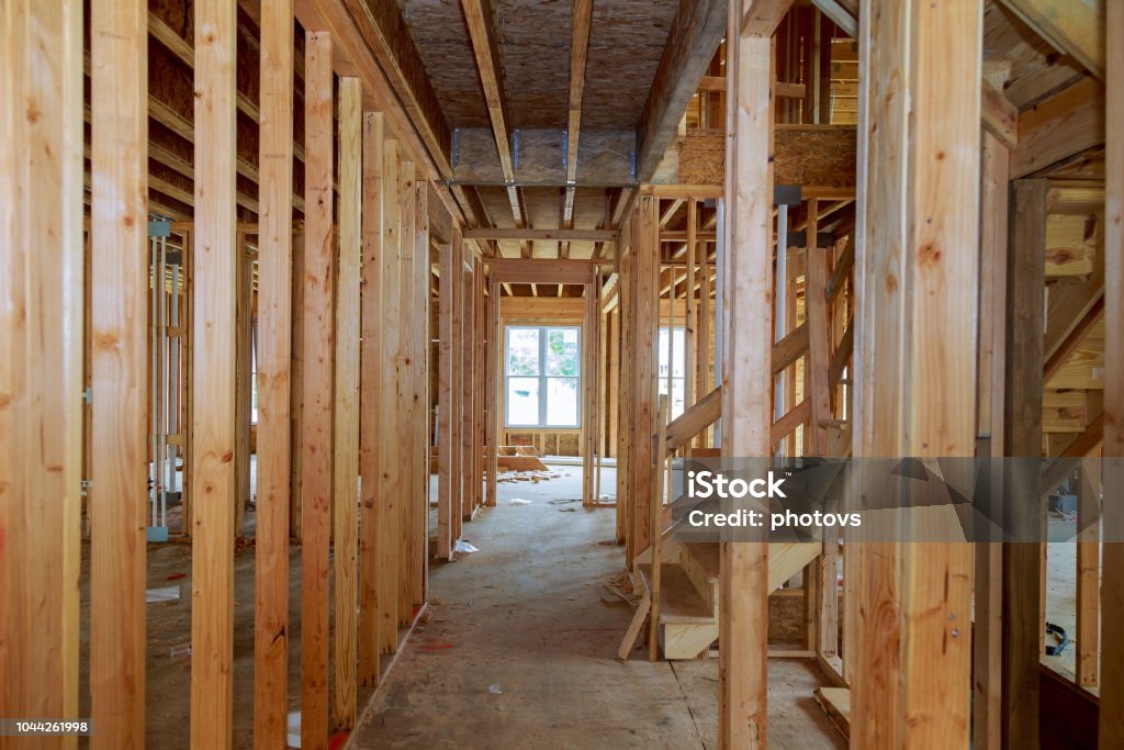 New construction framing house with frame New construction framing stick built house with frame Construction Industry Stock Photo