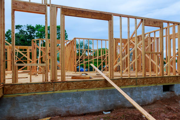 istock Residential home framing view on new house wooden under construction 1044262000