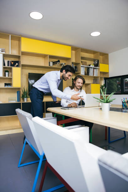 istock Two young businessmen working  at office 1044263246